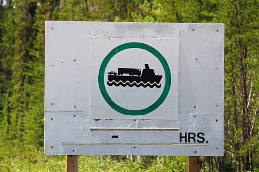 Signs indicating that the ferry is operational.