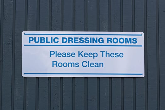 Public dressing rooms, please keep them clean sign.