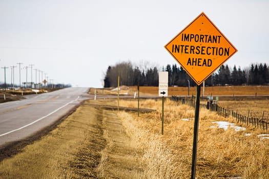 Important intersection ahead sign