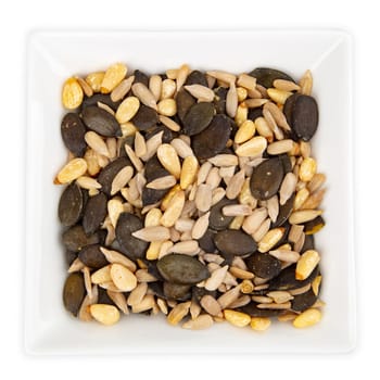 Variety of nuts and seeds for salad in a bowl isoladet on white background