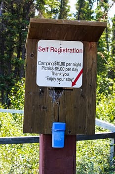 A self registration box with prices and money deposit.