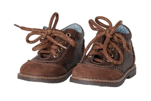 Child shoe fashion. A pair of elegant brown leather shoes with shoelaces for little boys isolated over white background. Leather and suede shoes for spring or autumn.