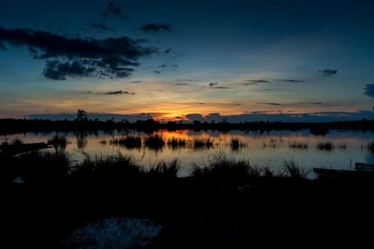 Sunset Over Lake, moody sky with reflection