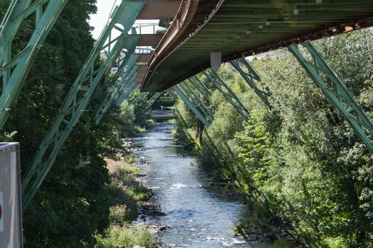 The supporting framework of the Wuppertaler suspension railway consists of a steel framework with inclined supports and suspended steel bridges so-called Rieppelträger.