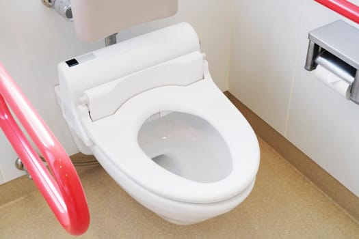 Toilet and handrail for elderly people at the toilet room, safty concept