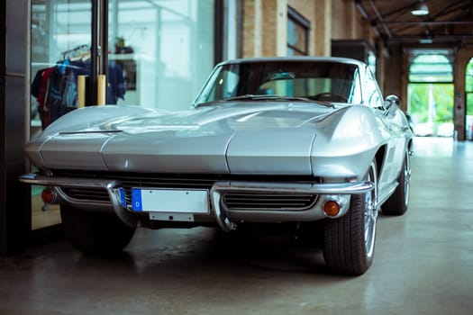 Classic vintage car. Close-up of headlights of luxurious vintage vehicle