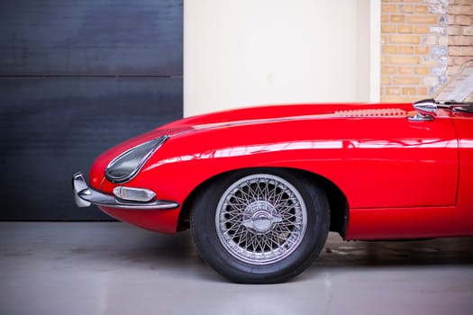 Classic vintage car. Close-up of headlights of luxurious vintage vehicle