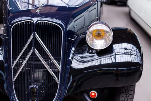 Close-up of headlights classic vintage car. Germany Exhibition
