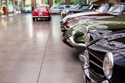 Classic vintage car. Close-up of headlights of luxurious vintage vehicle