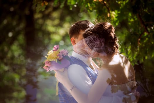 Married Couple in forest embracing