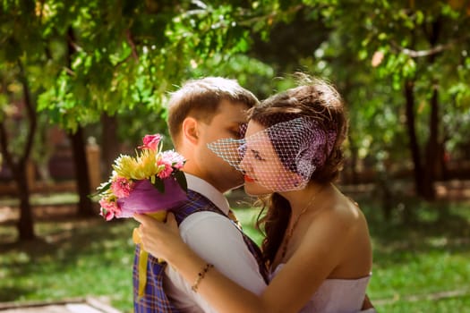 Married Couple in forest embracing