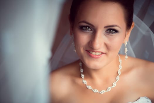 Happy Bride looking in window