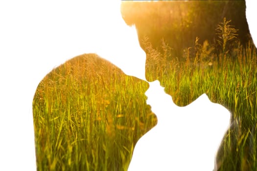 Double exposure portrait of kissing couple