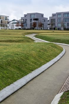 Unique Architectural Home Design Square Rectangular Geometric Angles Hard Right WIndows Alone Apartments Outdoors Park Public Store Path Leading