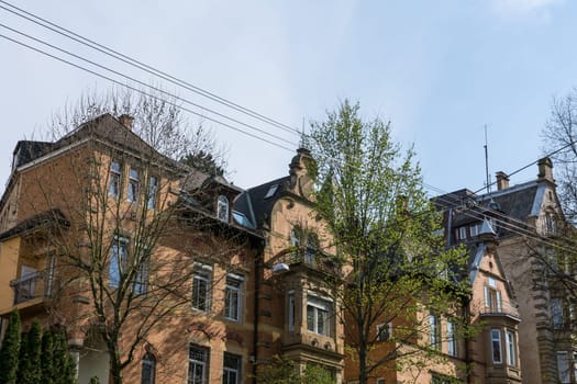 Blue Sky European Buildings Apartments Outdoors Green Day WCity Urban Typical Usual Sunny Weather Tree Architecture