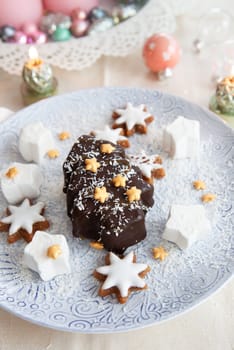 Chocolate covered ice cream in a Christmas tree shape with coconut