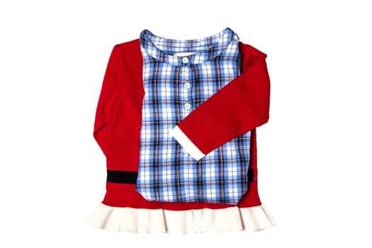 Christmas clothes. Blue checkered kids girl shirt with child girl sweater or jumper in Santa Claus design.