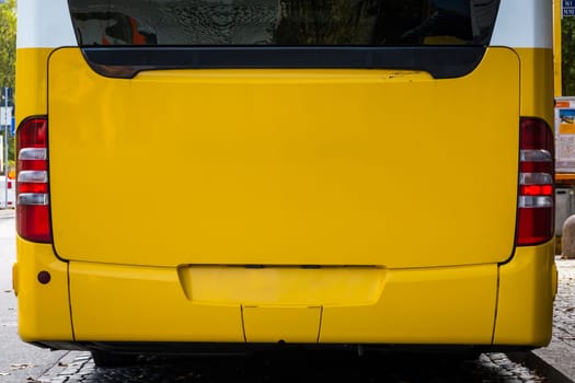 Bright Yellow Bus Behind Empty Mockup Advertising Space Public Transportation Vehicle Close Up