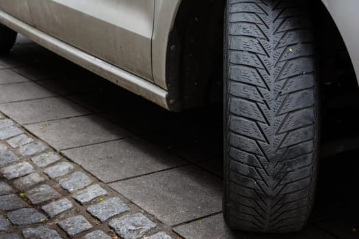Car Tire Turned Sidewalk Parked Black White Asphalt Road Dirty Used