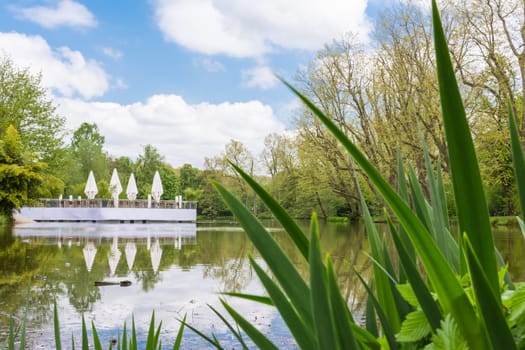 Tranquil Daytime Landscape Lake Pond Restaurant Cafe Peaceful White Clouds Umbrellas