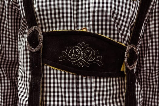 Traditional German Lederhosen Center Chestpiece Closeup Leather Plaid Dress Black White