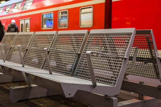 Train Station Metal Wire Bench Public Sitting Waiting German European Outdoors Red Color Closeup