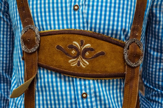 Traditional German Lederhosen Center Chestpiece Closeup Leather Plaid Dress Blue White