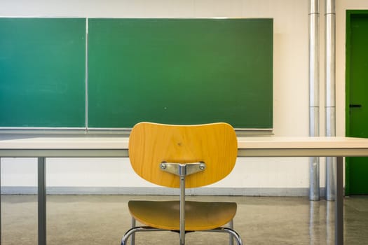 Empty Wooden Chairs at Tables Depth of Field Lecture Hall Nobody Green Chalkboard University Education College Higher Single Seat