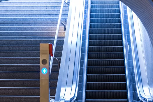 abstract, airport, architecture, background, blue, blur, building, business, city, construction, elevator, empty, escalator, glass, going, inside, interior, lift, london, mall, metal, modern, motion, move, movement, moving, nobody, office, people, perspective, public, side, stair, staircase, stairs, stairway, station, steel, step, subway, technology, transport, transportation, travel, underground, up, urban, view, walkway, way