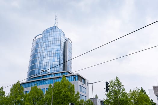 Glass Highrise Blue Facade Modern Office Building Business City Overcast Weather Trouble Clouds