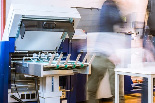 Paper Folding Machine Rollers Conveyor Belt Output Feed Printing Industry Press Production Working Blur