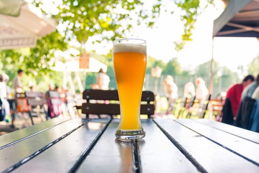 German Beer 0,5 Liter on Wooden Table Biergarten Traditional Culture Beautiful Day