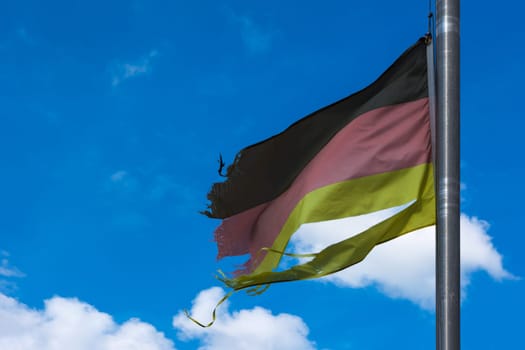 German Flag Black Red Gold Patriotic Symbol on Blue Sky Background