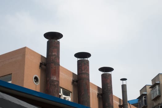 Tall Chimneys of an old Chinese building