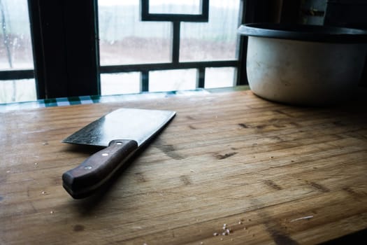 Kitchen Knife on Cutting Board in China