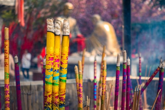 Chinese People Burn Incense and Pray in an Ancient Chinese Temple