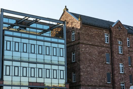 Old vs New Architecture Comparison Glass Building and Brick Side by Side