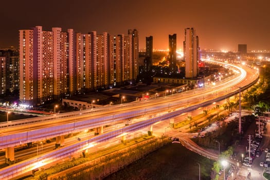 Night Scene of Chinese City Environment with Apartment and Expressway