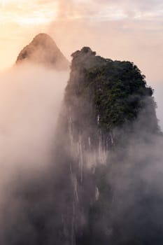 Mountain Peaks in Cloudy Sunrise Foggy Landscape Yangshuo