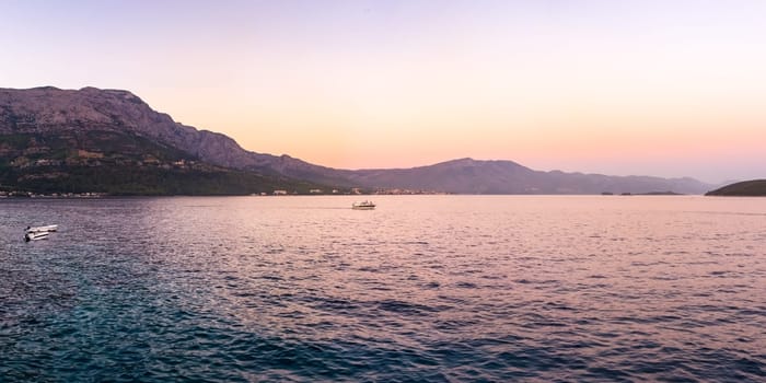 Beautiful Sunset Dusk Ocean Mountain Landscape in Croatia European Vacation Destination