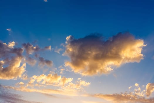 Beautiful Sunset Clouds with Fiery Colors in Sky without Land