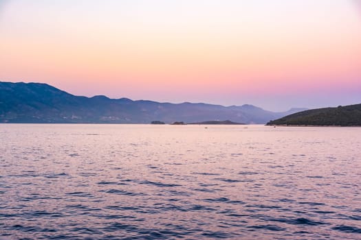 Beautiful Sunset Dusk Ocean Mountain Landscape in Croatia European Vacation Destination