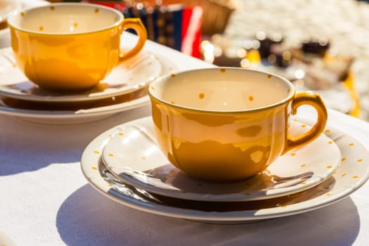Yellow Polka Dot Teacup on White Tablecloth Tablewear Cafe Drinking