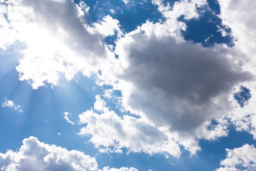 White Clouds Blue Sky Fluffy Sun Flare Airplane Trail  Sunny Daytime Texture Background