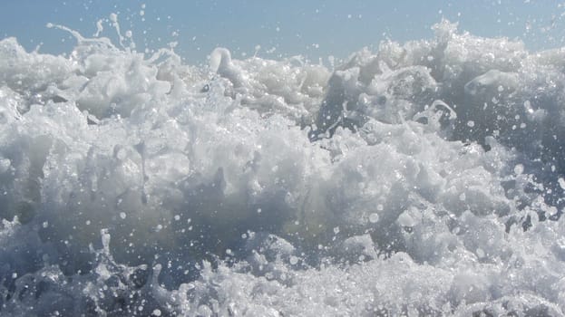White Foam Crashing Waves Ocean Shore Closeup