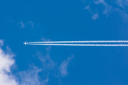 White Clouds Blue Sky Fluffy Sun Flare Airplane Trail  Sunny Daytime Texture Background