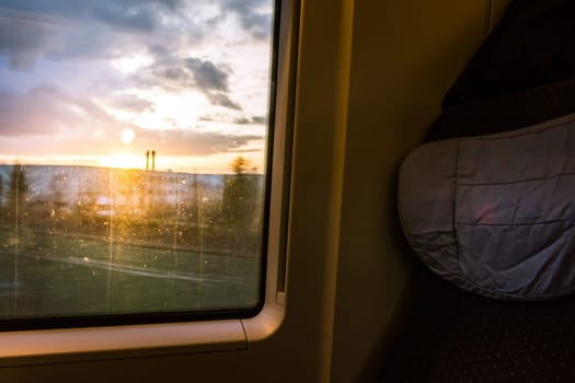 Sunset Through Train Window Passenger Seat Farmland Outdoors