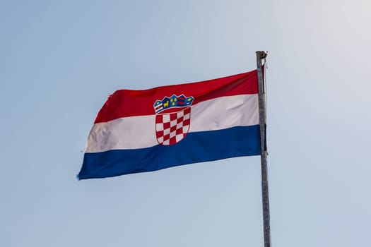 Croatian Flag on Blue Sky Background Bright Sunny Day Closeup Detail
