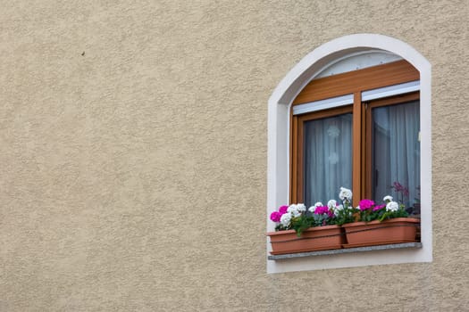 Cute European WIndow on Stucco Wall Texture Background with Copyspace