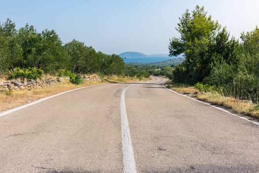 Scorching Hot Croatian Landscape Summer Day Road Perspective Valley and Mountains